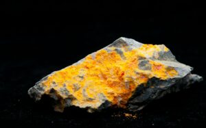 realgar mineral with stibnite and granite